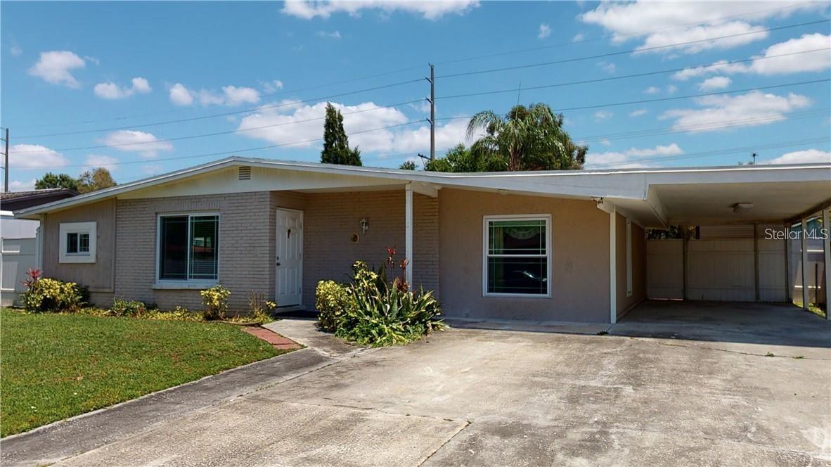 Location, location, location. Beautifully remodeled move-in ready home ready for you. 3 bedroom and 2 baths with newer stainless steel appliances, granite countertops and wood cabinets. Fully fenced in yard with shed, laundry room is located behind the carport with ample storage and easy access. Close to shopping, Veterans Expressway and the airport. This is a must to see.