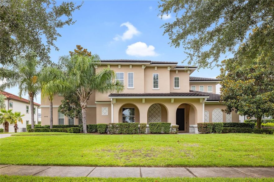 Under contract-accepting backup offers. This move-in ready estate in a sought-after gated community in Windermere offers an impressive array of features and amenities. The exterior boasts palm trees, a landscaped front yard, and a wide stone driveway with ample space for a boat. The 6-bedroom home spans over 6,300 square feet, blending classic old-world charm with modern updates.  The kitchen, located just off the entryway, is equipped with stainless steel appliances, granite countertops, recessed lighting, a spacious center island, and a breakfast bar that extends into the expansive living room.  Adjacent to the kitchen is the dining room and a home office. The screened-in lanai provides a comfortable outdoor space with a breezy atmosphere, an outdoor shower, and plenty of room for entertaining. From the lanai, you can enjoy a picturesque view of the spa and pool in the backyard, complete with a stone paver deck and a tall hedge border for privacy.  The master bedroom, conveniently situated on the main level, includes a seating area overlooking the pool. The ensuite bathroom features two walk-in closets, his-and-hers vanities, custom tilework, and a corner soaking tub.  Heading upstairs, you'll find the remaining bedrooms and a spacious flex space that offers various possibilities. This versatile area includes a wet bar and a built-in media center, allowing you to create a lounge, a game room, a gym, or another office space. The guest bedrooms share Jack-and-Jill bathrooms with the same high-quality finishes found in the master suite. Additionally, there's a multi-level theater room upstairs, perfect for movie nights or entertainment.  Located in Lake Davis Reserve, a quiet and private cul-de-sac community surrounded by nature, this property offers a tranquil setting with few neighbors. The community is zoned to top-tier schools and offers easy access to shopping, dining, and major highways, all just a short drive away. Full house generator, new AC's (2018,2019 ), new pool equipment and new flooring throughout.