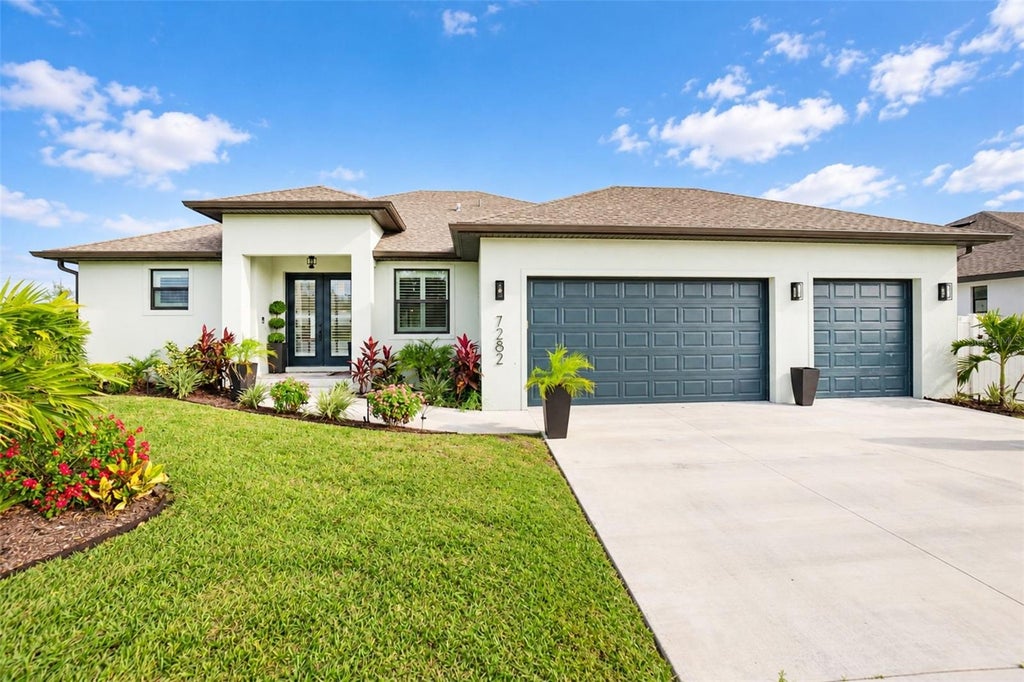 Photo of 7282 Printer Street, Port Charlotte, FL 33981 (MLS # C7532584)