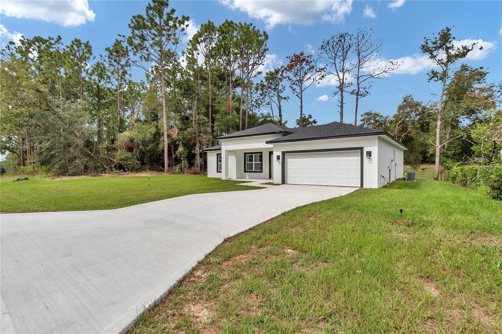 Photo of 10932 N Frantz Avenue, Citrus Springs, FL 34434 (MLS # O6341620)