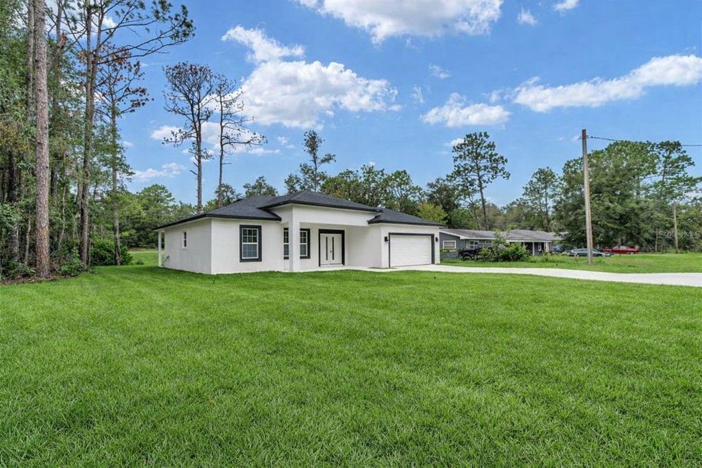 Photo of 10932 N Frantz Avenue, Citrus Springs, FL 34434 (MLS # O6341620)