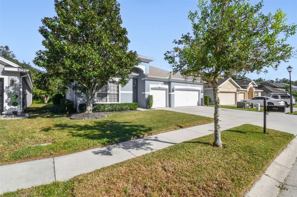 Photo of 6818 Pine Springs Drive, Wesley Chapel, FL 33545 (MLS # TB8438233)