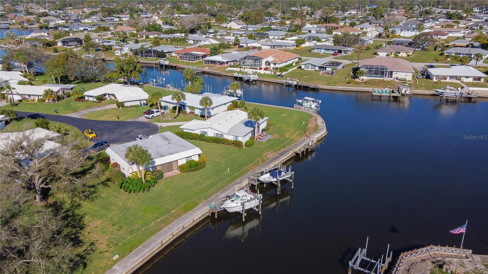 Auction Property. THIS HOME TO BE SOLD AT AUCTION OCTOBER 2ND- 8TH VIA ONLINE BIDDING!
Welcome to the waterfront community of Englewood Isles, where coastal charm and effortless living come together. This beautifully updated home offers not only modern comforts but also DIRECT WATER ACCESS, making it an ideal retreat for boating enthusiasts and those seeking the tranquil, Florida lifestyle. At the heart of the home is a beautifully renovated kitchen, featuring premium appliances, custom cabinetry, and a spacious center island perfect for entertaining. The open floor plan seamlessly connects the kitchen to the dining area and living room, creating a warm and inviting space for hosting family and friends. Modern upgrades add convenience and peace of mind to this exceptional property with HURRICANE IMPACT WINDOWS AND SLIDERS, and a propane system powering the range, dryer, water heater, and an outdoor grill connection. Boaters will appreciate the 42 FEET OF SEAWALL offering direct water access1 Add a boat lift, and easily embark on fishing trips, leisurely cruises, or scenic adventures along the Intracoastal Waterway. The home’s prime location provides quick access to marinas, yacht clubs, and waterfront restaurants, emphasizing the coastal lifestyle. Embrace the luxury and ease of living in Englewood Isles, where every day feels like a vacation! Reasonable condo association fee includes all landscaping, community pool, seawall maintenance. With endless opportunities for relaxation and exploration, this Gulf Coast gem invites you to create your own slice of paradise. Don’t wait—make this waterfront dream home your reality today.