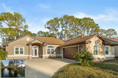 Photo of 36 Walker Drive, Palm Coast, FL 32164 (MLS # FC315888)