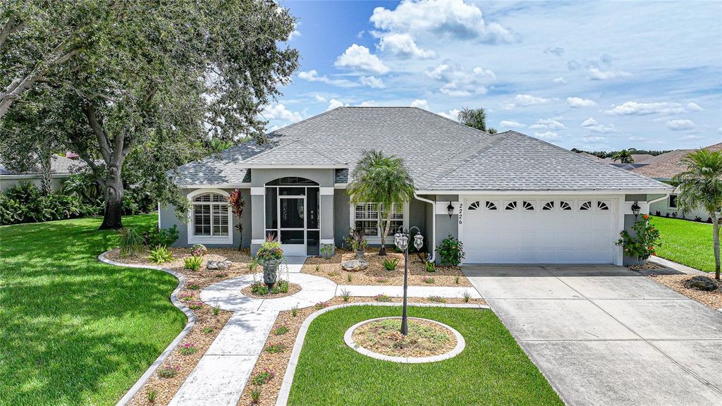 Photo of 2226 Charleston Park Drive, North Port, FL 34287 (MLS # TB8403216)