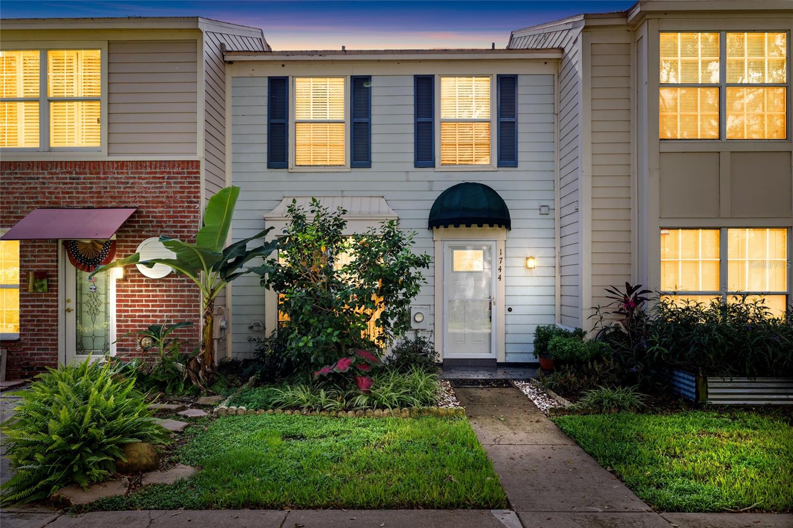Imagine a charming townhome in the heart of Tampa that offers over 1200 square feet of living space for only $230,000! This beautiful home boasts two spacious bedrooms with en suite bathrooms, a large living and dining area, and a gourmet kitchen with a pantry, cabinets painted in a beautiful blue, and a cozy breakfast nook in a bay window. The kitchen opens up to a breakfast bar and seamlessly connects to the living and dining room, creating a spacious and inviting layout for a family dinner or entertaining friends. Step through the glass-paned door to relax on the covered and screened lanai, which features ample storage space. The backyard is a paradise for relaxing, while enjoying the view of the garden bed filled with flowers or a vegetable garden. Head up the gorgeous hardwood stairs to the two oversized bedrooms, each equipped with an ensuite bathroom. The primary bedroom is generously sized and could accommodate a large set of bedroom furniture or king bed and a cozy seating area for unwinding at the end of the day. The second bedroom is ideal as a guest room and/or office, as well as a massive double closet, and an ensuite bathroom. Nestled in the Fletchers Mill community, this townhome offers peaceful and quiet surroundings where you can enjoy an evening stroll to the community pool or a quick game of tennis on the courts. Despite its secluded location on a quiet street, the townhome is conveniently situated near shopping, restaurants, the airport, and major roadways, and only 12 miles to downtown Tampa or 18 miles to MacDill AFB. This beauty won’t last long, so book your showing now!