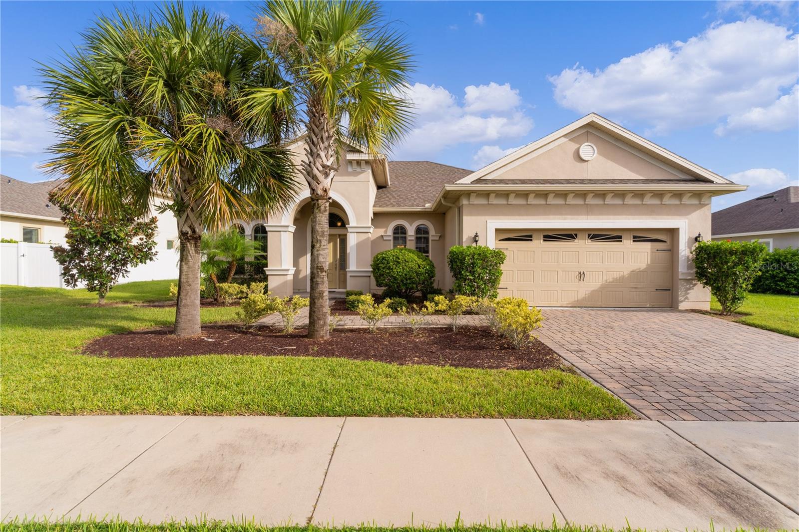 Welcome to 309 Misty Haven Dr, Groveland, FL 34736! This exquisite 4-bedroom, 3-bathroom home in the desirable Cherry Lake Oaks community blends modern elegance with practical living, perfectly suited for today’s dynamic market. In a time of fluctuating interest rates and strong demand for move-in-ready homes, this property stands out with its thoughtful design and prime location.Featuring a private office with sleek French doors, this home is ideal for remote work or a quiet retreat. The gourmet kitchen boasts granite countertops, a large island, oversized cabinetry, and premium stainless steel appliances, catering to both avid entertainers and busy families. A tankless water heater ensures energy efficiency and endless hot water, a valuable asset in today’s eco-conscious market.The master suite is a luxurious haven, with dual walk-in closets, a spa-like walk-in shower, a separate soaking tub, and dual vanities. Two secondary bedrooms share a convenient Jack-and-Jill bathroom with a shower/tub combo, while the fourth bedroom is adjacent to a full bath with a walk-in shower. The expansive backyard offers ample space for a pool or custom outdoor oasis, adding appeal for buyers seeking versatile outdoor living.With a 2-car garage and abundant storage, this home balances style and functionality. Located in Lake County’s thriving real estate market, it provides easy access to US 27, top-rated schools, shopping, dining, and Central Florida’s attractions, including Orlando’s world-famous theme parks. Built by Hibiscus Homes, renowned for quality craftsmanship, this property is a rare find in a competitive market with low inventory.Don’t miss this opportunity—schedule a tour today to explore this move-in-ready gem!