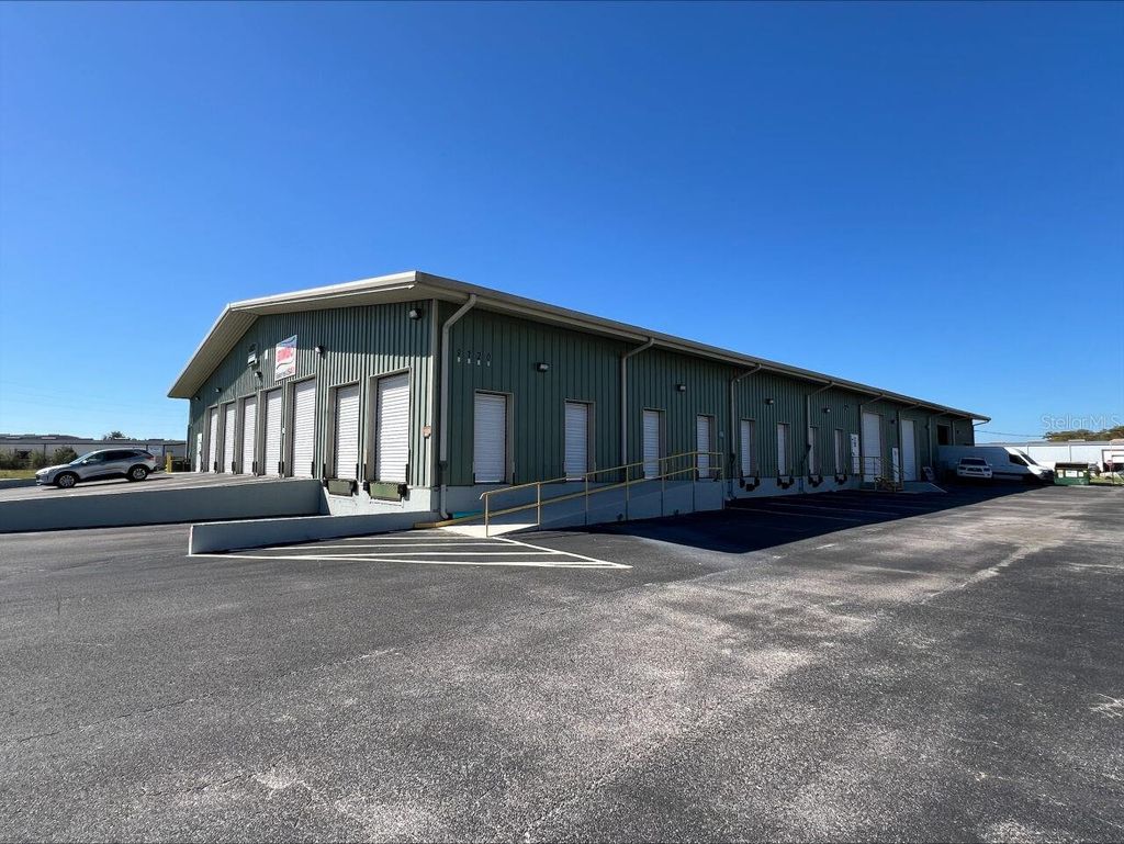 Photo of 9120 Craftsmans Drive #101, Hudson, FL 34667 (MLS # TB8444751)