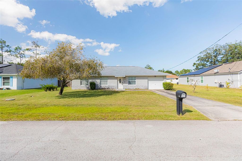 Photo of 29 Raeland Lane, Palm Coast, FL 32164 (MLS # FC316060)