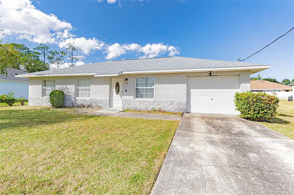 Photo of 29 Raeland Lane, Palm Coast, FL 32164 (MLS # FC316060)