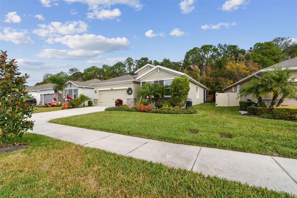 Photo of 32813 Sand Creek Drive, Wesley Chapel, FL 33543 (MLS # TB8457683)