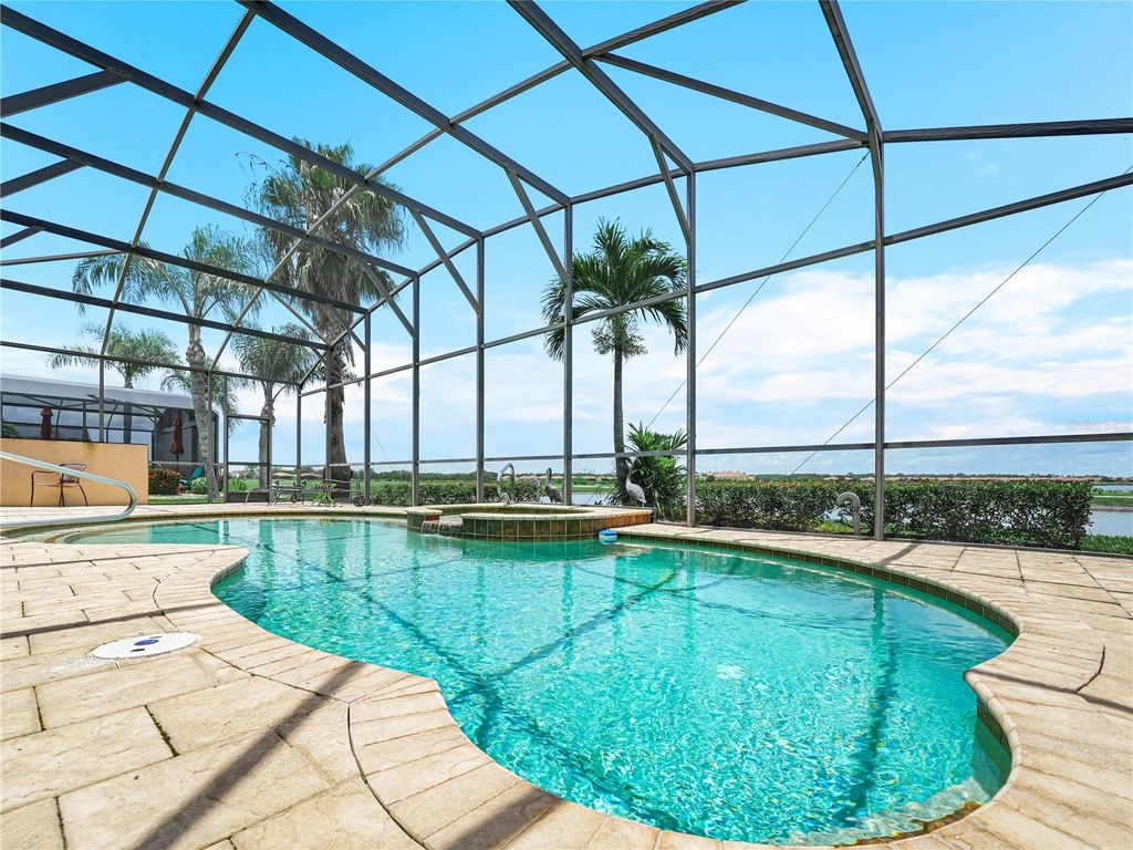 Photo of 5200 Pebble Beach Boulevard, Winter Haven, FL 33884 (MLS # P4935325)