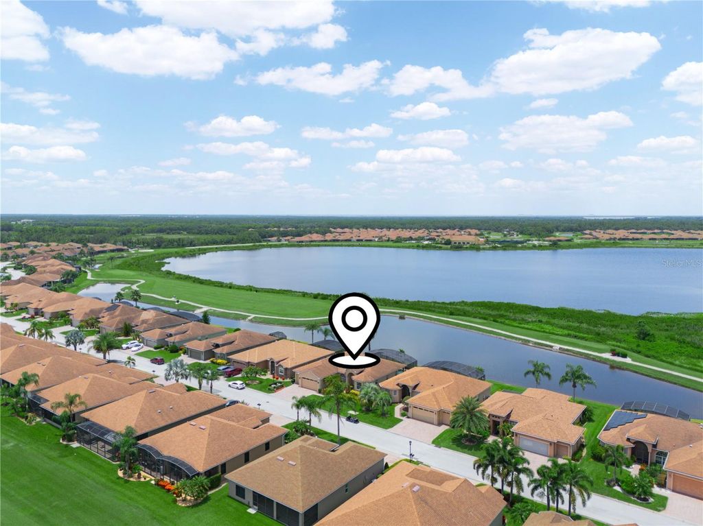 Photo of 5200 Pebble Beach Boulevard, Winter Haven, FL 33884 (MLS # P4935325)