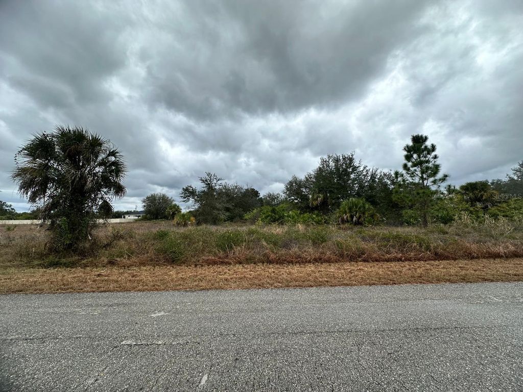 Photo of 1610 Scott Avenue, Lehigh Acres, FL 33972 (MLS # FC315059)