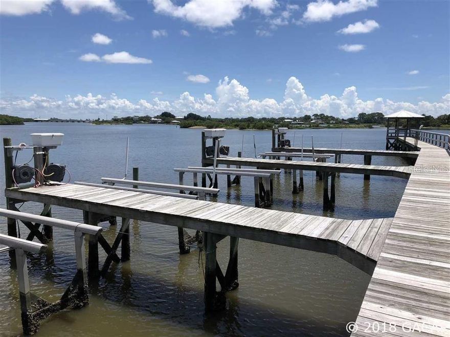 This deed-restricted Community includes brick paved roads, walkways, street lights, boat dock, Common area, gazebo and planned swimming pool. Boat Lift/Slip not included with Lot. Soak up the scenery in the breezy ocean air. This Community is beautifully done for that perfect get-away! Still verifying utilities and availability, buy houses already built in Anchor Cove. Open Builder.