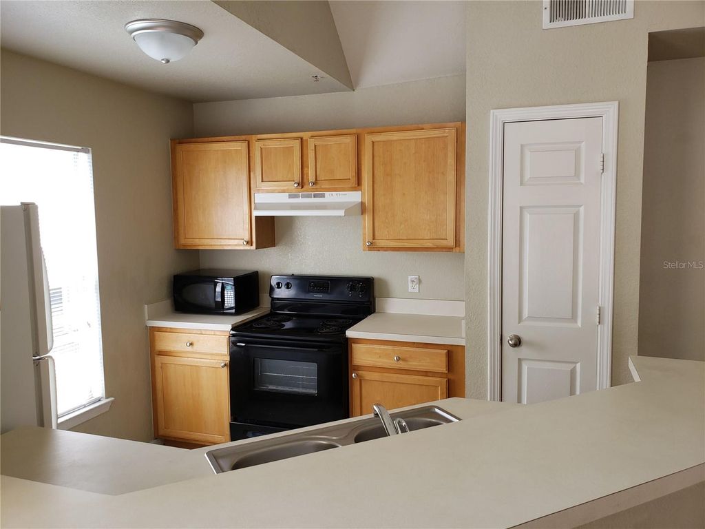 Photo of 9069 Lee Vista Boulevard #1210, Orlando, FL 32829 (MLS # O6405413)