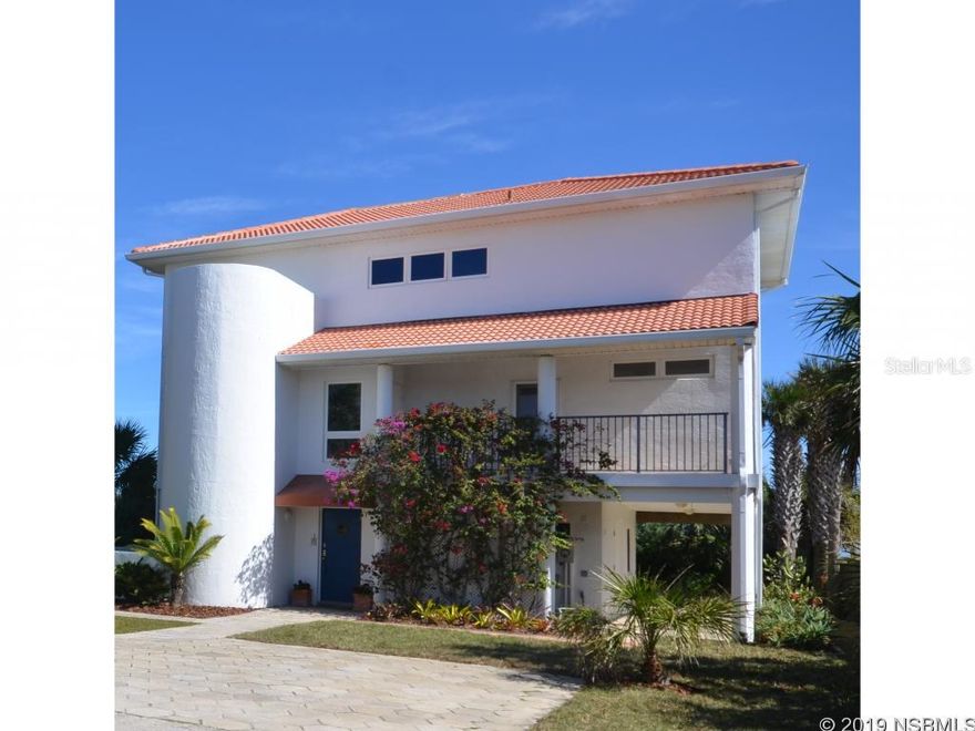 Mediterranean Style Oceanfront Home on  Quiet North Beach Street. 1.17 Acres ownership to mean high water line.  Views of the beach and Atlantic Ocean from the third  and second floor level living area along with doors to the oceanfront decks. Third floor master suite with two person study. Soaking tub in M-Bath with ocean to sky views.  Lower floor offers views of the private dune area and private path to the beach. Great room concept in the living dining and kitchen area. A separate kitchen deck is plumbed for a gas grill.  A Library/guestroom with built-in shelves is located off the 2nd floor living area. The house has Natural gas for dryer and tank less hot water.  RV parking with 30 amp exterior receptacle for RV hookup. Detached 832 sq ft garage and separate utility shed. Concrete Barrel Tile Roof. The house offers ample storage area as well as room for a pool or separate guest house.   Walk to the inlet park just north of this home or walk to the intra-coastal waterway for sunsets. ;Water: City