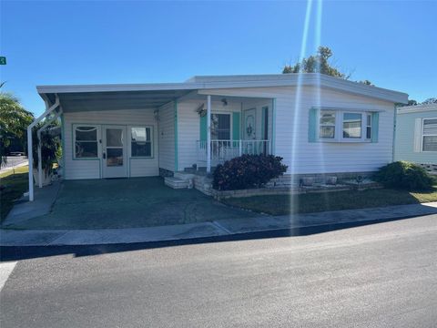 Photo of 701 Sugar Palm Street, Largo, FL 33778 (MLS # TB8444430)