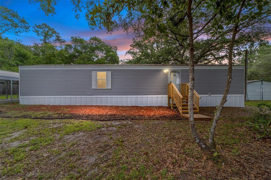 Enjoy tranquil lakefront living in this charming 2-bedroom, 2-bathroom home, perfectly positioned across from scenic Owens Lake. Nestled on .58 of an acre on a quiet dead-end street, the setting offers exceptional privacy and peaceful surroundings, where sandhill cranes, deer, ducks, and other wildlife are part of everyday life. Inside, the thoughtfully designed open floor plan is filled with natural light and tasteful modern finishes; ideal for both full-time living or a relaxing weekend getaway. A spacious concrete two-car carport offers plenty of covered parking for vehicles, boats, or outdoor equipment, and the extra large enclosed workshop adds valuable space for hobbies, boat care, or storage. Step outside to experience stunning sunrises and sunsets over the lake, or take advantage of the nearby access to enjoy fishing, kayaking, and other water adventures. Whether you’re seeking a quiet primary residence or an attractive short-term rental opportunity, this Silver Springs gem offers a rare chance to own a peaceful slice of Florida paradise. Schedule your private showing today, don’t miss out! Buyer to verify all measurements and school zones.