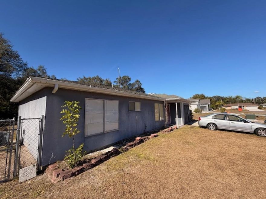 Investor Special — Priced to Move Fast!
Solid 2-bed, 2-bath single-family home located in an established Port Charlotte neighborhood with NO HOA. This property offers a functional floor plan, attached garage, screened lanai, and a spacious backyard on an oversized lot. Home is in livable condition but needs TLC and updating, making it an excellent opportunity for an investor, flipper, or buyer looking to renovate and add value.

Roof, systems, and interior updates should be evaluated by buyer. Ideal for a cash buyer or renovation loan. Conveniently located near shopping, dining, schools, and major roadways. Priced aggressively for a quick sale — seller is seeking a fast, clean closing.