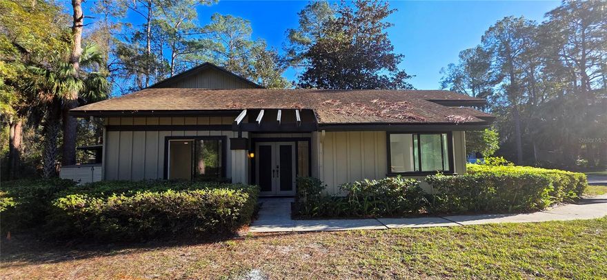 The best location in the Gainesville area! Close to schools, hospitals, shopping - this well-maintained end unit in the Forest of the Unicorn (The Lakes) is nestled in a cul-de-sac. Because it is on the end, you have the feel that your yard is much larger. Back patio out the back sliding glass doors is private and a perfect place to retreat and enjoy being outside. Storage space outside. Low HOA fees make this condo much more affordable than most! And wait til springtime! The azaleas are ablaze right outside your windows. Take a look today, you won't want to leave!