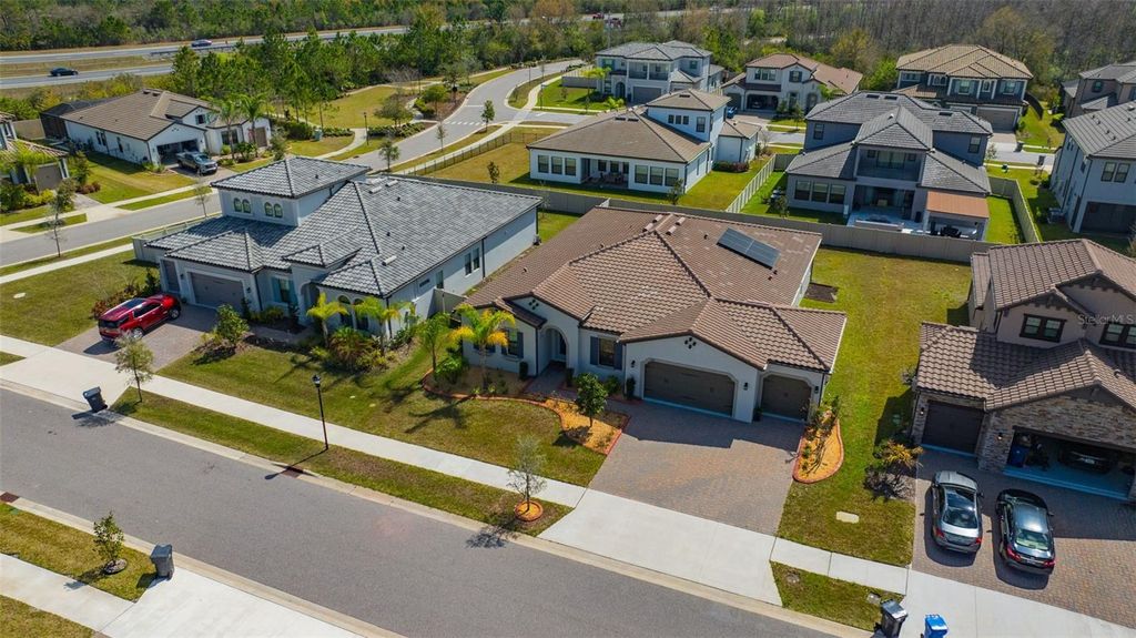 Photo of 6167 Marsh Trail Drive, Odessa, FL 33556 (MLS # TB8483250)