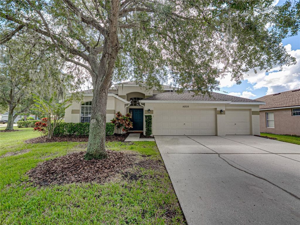 Photo of 16325 Bridgeglade Lane, Lithia, FL 33547 (MLS # TB8431874)