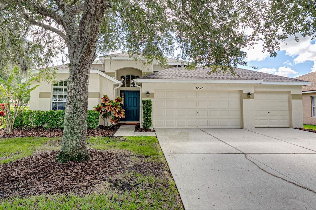 Photo of 16325 Bridgeglade Lane, Lithia, FL 33547 (MLS # TB8431874)