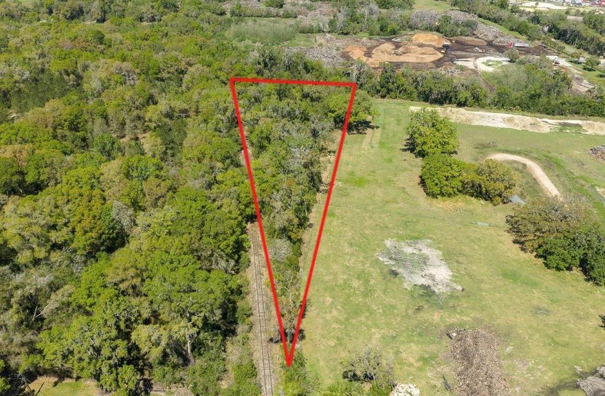 Two beautiful wooded acres zoned M-1 offering endless possibilities for your future plans! This private parcel is filled with natural beauty and mature trees, making it an ideal setting. Please note: this parcel is currently landlocked with no legal access in place. A rare opportunity to own a large tract of land with tons of potential at an affordable price!