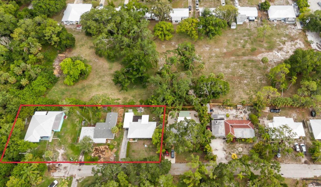 This and the two properties next door can be purchased as a bulk sale together with 4500 N Tamiami Trail. This is a land consideration towards a commercial project to increase density. Currently the density is 135 units per acre.