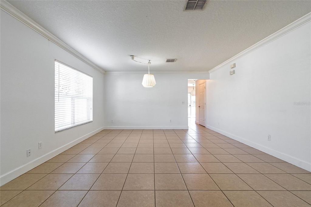 Photo of 939 Flower Fields Lane, Orlando, FL 32824 (MLS # O6391572)