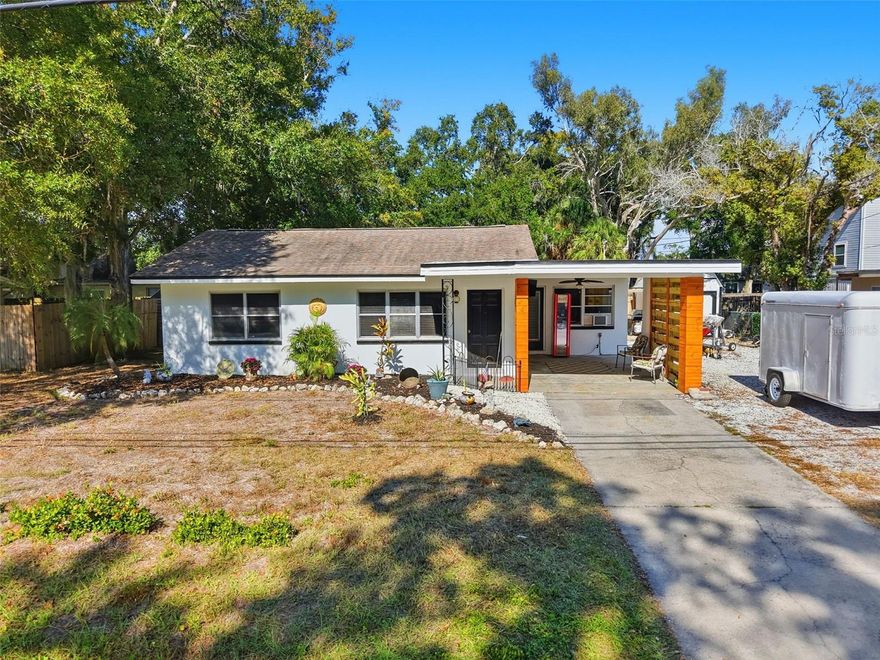 Welcome to this beautiful 2-bedroom, 2-bathroom home in Palm Harbor! This inviting home did NOT FLOOD and sits on a quiet, peaceful street just steps from Lake Tarpon and offers a comfortable blend of character and modern updates. The freshly painted exterior lays the perfect base for you to customize with decorations and gardening! Inside, classic terrazzo floors flow throughout the main living areas, complemented by granite countertops and stainless steel appliances in the kitchen. A versatile den provides the perfect space for a home office, reading room, or additional guest area. The large attached bathroom is thoughtfully designed with in-home laundry for added convenience. The spacious backyard is ideal for relaxing or entertaining, with plenty of room for an outdoor grill, gardening, or your future adventures. A covered carport offers shaded parking or an additional outdoor seating area, and the generous storage shed ensures you have space for tools, bikes, and seasonal items. This home is nearby to restaurants, grocery options, parks, and local entertainment. Schedule your showing today and don’t miss the wonderful opportunity to enjoy Florida living at its best!