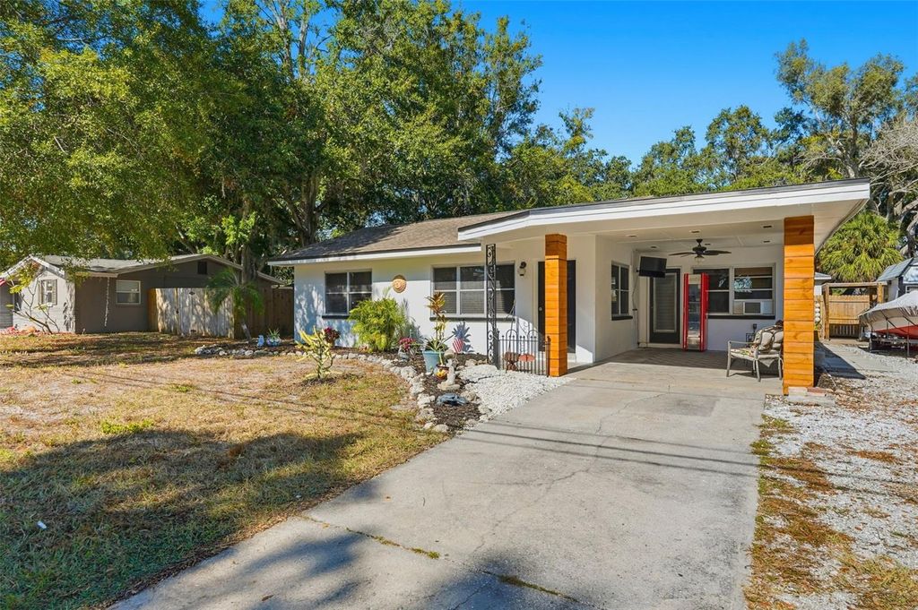 Photo of 42 Lake Shore Drive, Palm Harbor, FL 34684 (MLS # TB8446618)