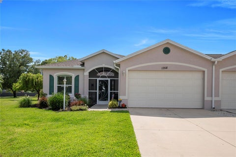 Photo of 1358 Hedgewood Circle, North Port, FL 34288 (MLS # O6420154)