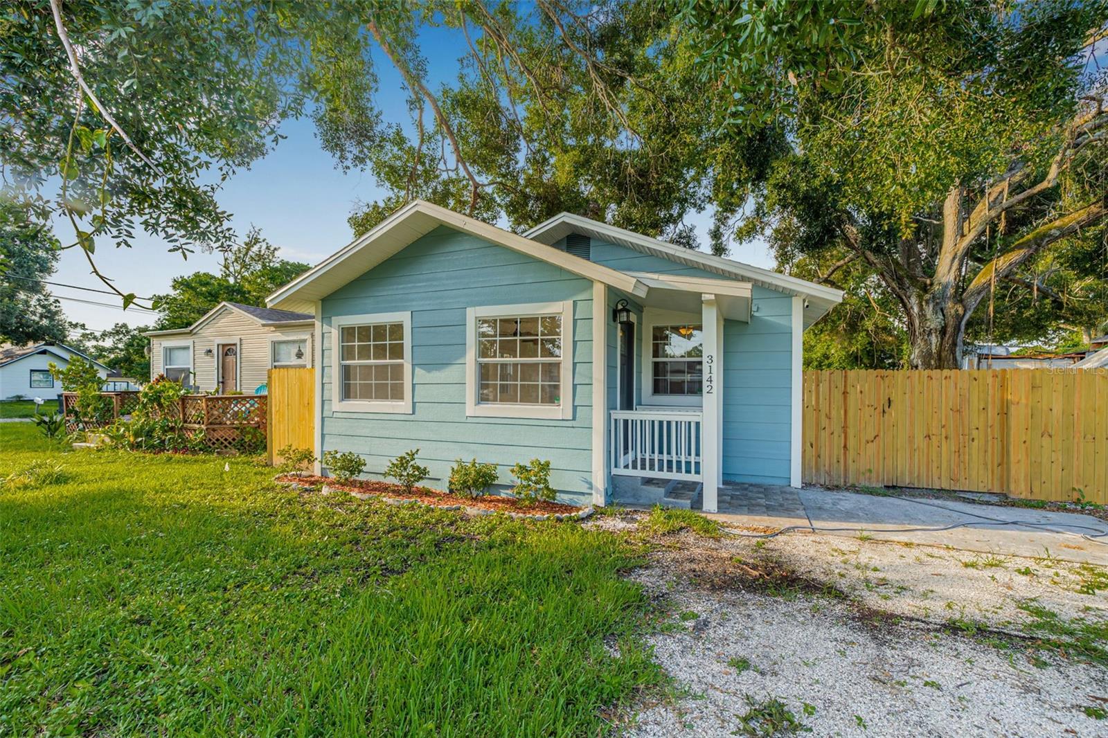 Completely Remodeled & Move-In Ready! This 2-bedroom, 2-bath home shines with modern finishes and a prime St. Pete location. Featuring brand-new laminate flooring, white shaker kitchen cabinetry, fresh interior & exterior paint, and updated trim throughout, every detail feels fresh and stylish. Both bathrooms have been tastefully renovated, including a spacious primary bath with dual sinks and a large walk-in shower. Enjoy the open, airy layout and a huge backyard—perfect for entertaining, gardening, or future expansion. Added bonus: inside laundry for everyday convenience. All of this is just minutes from Downtown St. Pete, with quick interstate access for easy commutes to local airports, award-winning beaches, shopping, and dining. Turnkey and ready for its next owner—don’t miss this one!