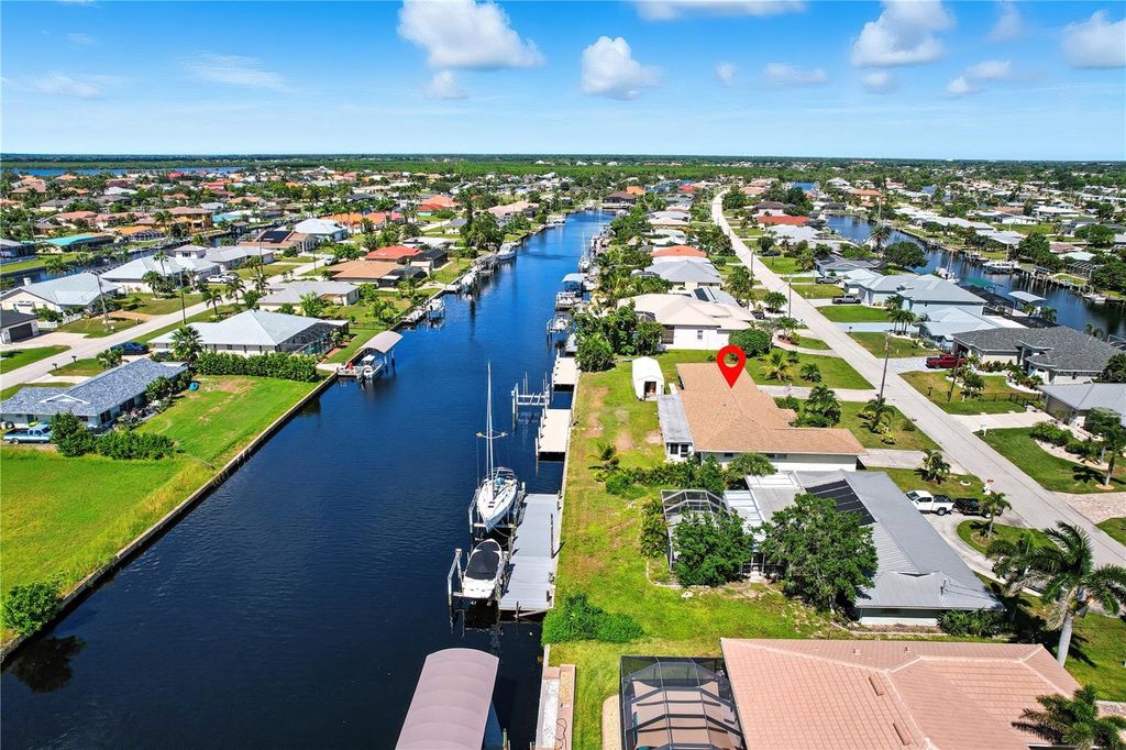 Photo of 133 Peckham Street SE, Port Charlotte, FL 33952 (MLS # N6142913)