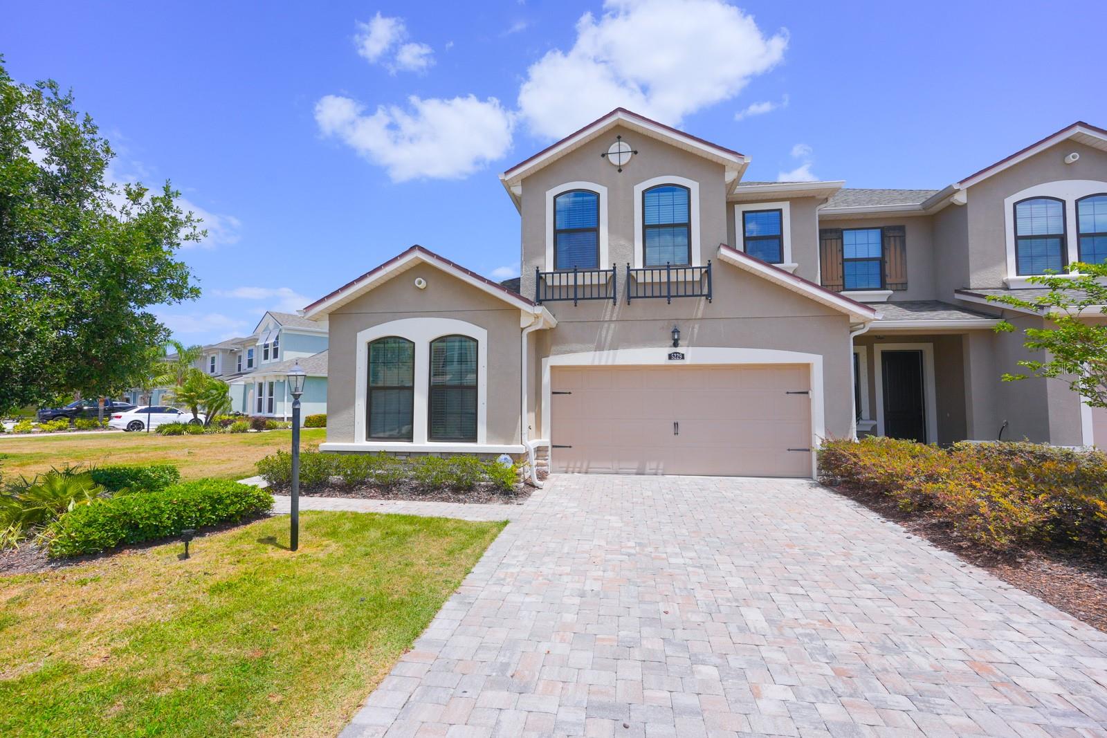 This home is vacant and ready for immediate occupancy, highly motivated seller, so don’t miss the opportunity! Gorgeous end unit Town Home. Built in 2018, this beautiful Mattamy home has all the bells and whistles of new construction. An open floor plan features a light and bright Great Room with high ceilings, perfect for entertaining, a split bedroom plan for privacy, and an additional upstairs bonus space for flexible living. Large Master with huge walk-in closet, large walk-in shower with dual sinks. The second bedroom is located at the front of the house for privacy and features a full bathroom right outside the door. In 2024 the flooring in both rooms was updated with Luxury Vinyl Plank (LVP). The gourmet Kitchen is open to the Dining Room and features a large island with breakfast bar, stainless steel appliances, 42" upper maple cabinets, and granite countertops. Beautiful Ventura Plank porcelain tile covers the kitchen, dining room, gathering room, foyer, laundry, and all bathrooms. Upstairs bonus room offers a full bath and a den-office room, plus a flex area that can easily be converted into another spacious and bright room with its own bathroom. The community of Harmony at Lakewood Ranch has much to enjoy, a community resort-style pool, state of the art fitness facility, a clubhouse, and a playground with walking and biking trails and maintenance-free landscaping! Close to I-75, shops, restaurants, downtown Sarasota and Bradenton, beaches, and St Armand's Circle.