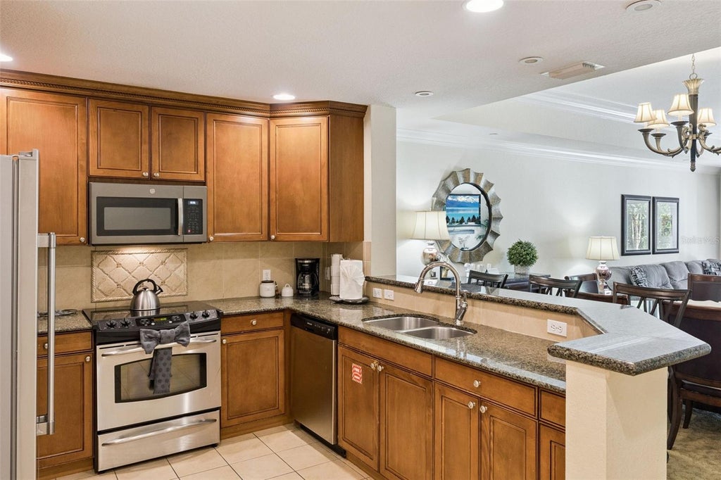 Photo of 7656 Whisper Way #102, Reunion, FL 34747 (MLS # S5157811)