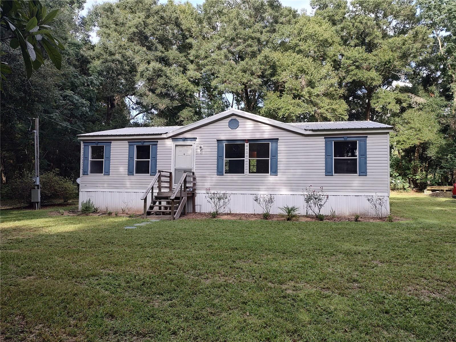 Completely Remodeled 3 Bed, 2 Bath Double-Wide Mobile Home on Independent Lot – No Water Bill!
This beautifully renovated 3-bedroom, 2-bathroom double-wide mobile home sits on its own oversized lot and offers both privacy and convenience in the heart of Ocala. Enjoy peace of mind with brand-new appliances, fresh interior and exterior paint, new flooring throughout, and so much more.
Property Highlights:
No water bill – property is on well and septic
Spacious lot with ample parking
Washer & dryer hookups
Large kitchen with plenty of counter and storage space
Luxurious main bathroom featuring a double showerhead
Second bathroom includes a soaking tub
Located in a top-rated school district – Zoned for Ward Highlands Elementary
Close to shopping, dining, and all that Ocala has to offer
This move-in-ready home is perfect for families or anyone seeking space, comfort, and convenience in a prime location.
Available September 1st This home has everything you need for comfortable, stylish living. Act fast – it won’t last long!