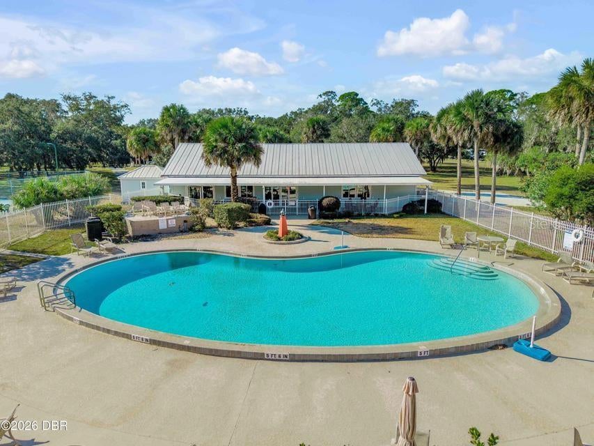Photo of 428 Eldora Drive, Oak Hill, FL 32759 (MLS # NS1089311)