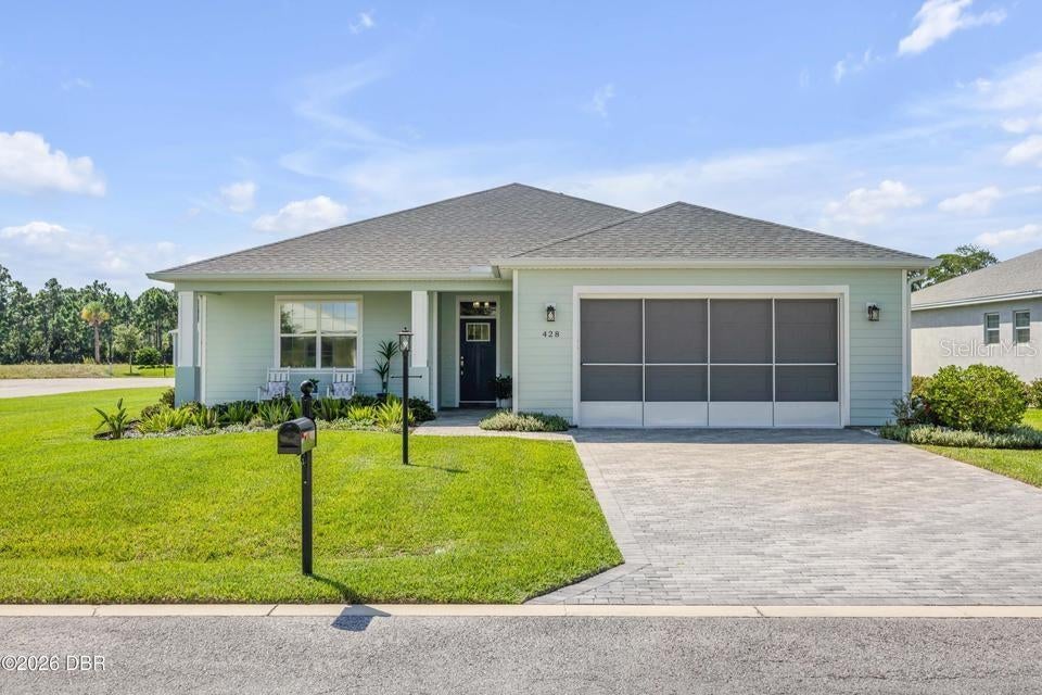 Photo of 428 Eldora Drive, Oak Hill, FL 32759 (MLS # NS1089311)