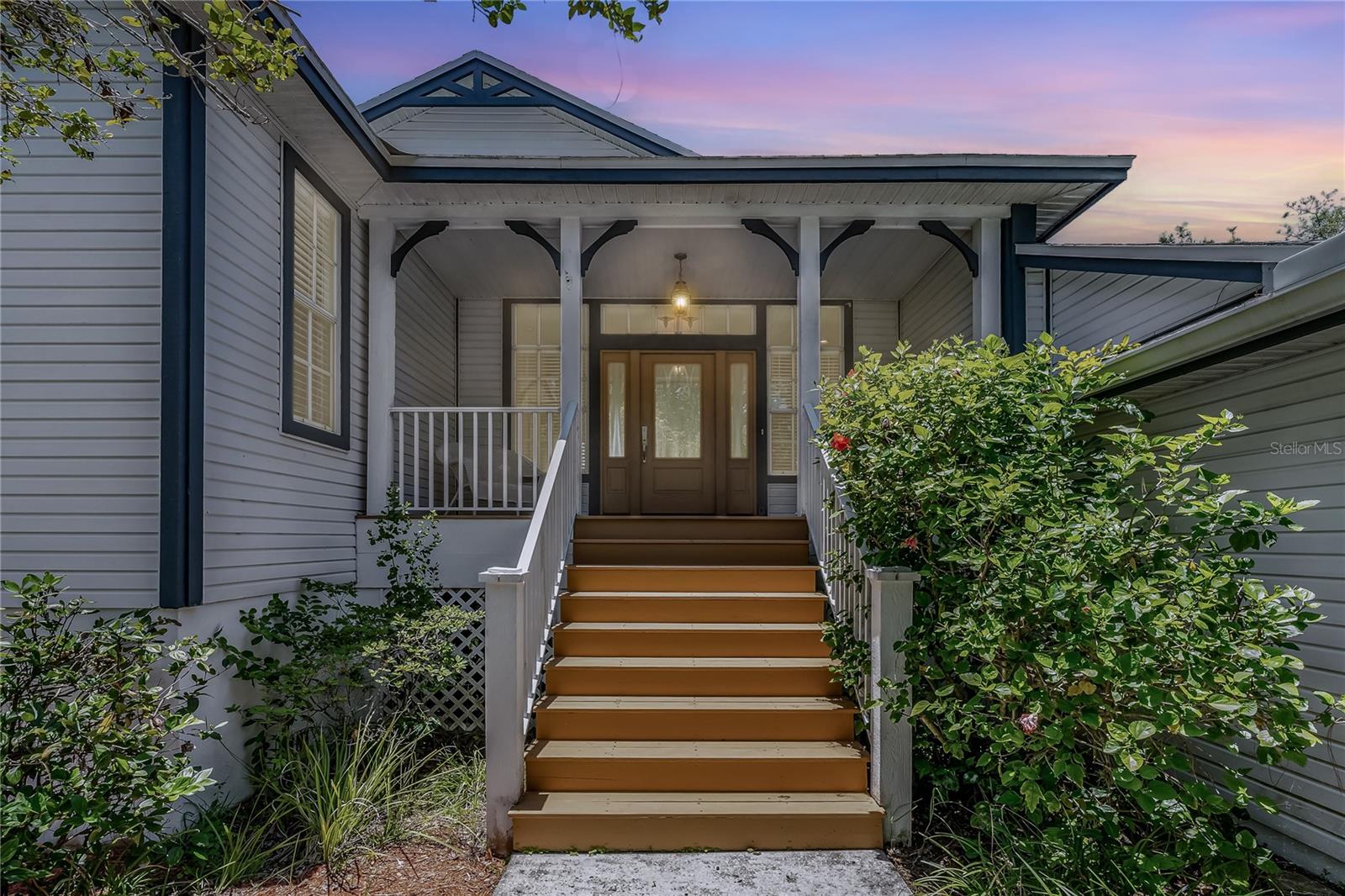 Welcome to your serene perfection nestled in the heart of Ozona! Securely elevated on a quiet cul-de-sac along the picturesque and tree-lined Grand Bay Street, this 3-bedroom, 2-bathroom original single-owner family home is where laid-back charm meets modern convenience. With 2,147 square feet of thoughtfully designed living space, this cozy home is perfectly situated on a private preserve, offering peace, privacy, and the pure air that Ozona is so loved for. From the moment you arrive, the welcoming front porch invites you in. It's the kind of spot where a morning cup of coffee just feels and tastes better. Inside, you’ll find a home filled with natural light, smart design, and stylish touches—like plantation shutters and beautiful transom windows that bring the outdoors in.
The open-concept kitchen and family room flow effortlessly together, making everyday living easy and enjoyable. Whether you’re cooking, relaxing, or entertaining, you'll love how connected this space feels to the surrounding nature. Step outside to your expansive, covered back porch and take in the sweeping conservation views—this is your front-row seat to peace and quiet. There's plenty of room out back to add a pool, or simply enjoy the fully fenced yard just as it is. The split bedroom floorplan adds an extra layer of comfort and privacy. The spa-inspired owner’s suite is your personal retreat. Unwind in the luxurious soaking tub, enjoy the walk-in shower, or get ready for the day at the dual sink vanity. Best of all, you’ve got direct access to that peaceful rear porch—perfect for evening stargazing or early morning yoga. The utility room offers bonus storage and a convenient sink, and the three-car garage gives you space for your gear, tools, and toys. A brand new water heater (2024) adds even more peace of mind.
Just outside your door, Ozona awaits. This charming coastal town is a hidden gem full of personality. From flip-flop-friendly golf cart rides to waterfront marinas, funky shops, great food, and live music—you’ll never run out of things to do. Launch your kayak or paddleboard just minutes from home, or explore the 47-mile Pinellas Trail just around the corner. Feeling adventurous? Take a short ride to Dunedin, Palm Harbor, or the famous Tarpon Springs Sponge Docks. With natural beauty, thoughtful features, and a location that captures the spirit of coastal Florida living, this Ozona preserve home is truly one of a kind. Come see why this quiet cul-de-sac gem is the perfect place to call home, so you can start living your best Florida Lifestyle Now!!