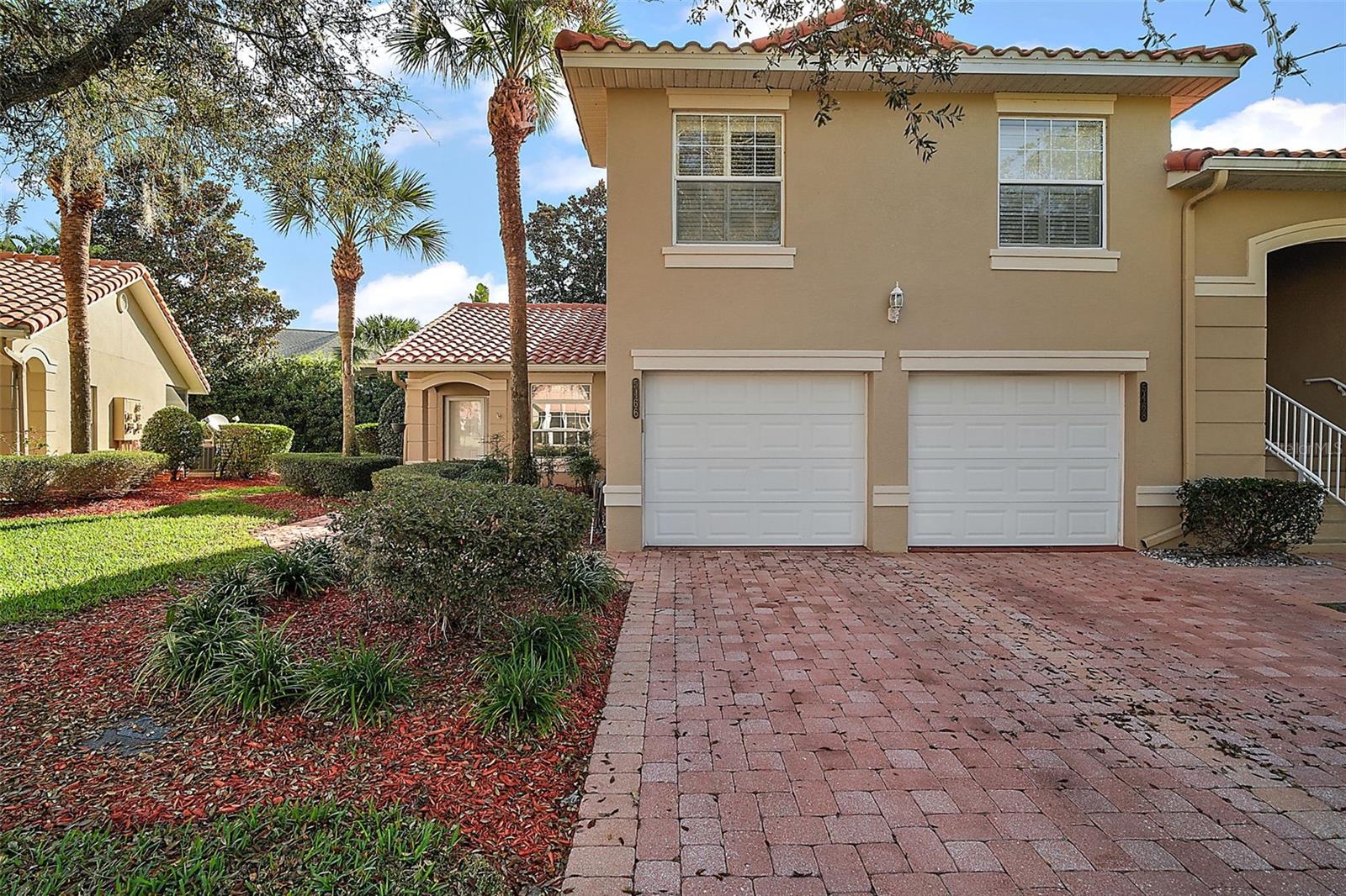 Escape to RESORT-STYLE LIVING in this maintenance-free condo perfectly situated on the edge of The Villages, offering an unparalleled blend of comfort and convenience. This spacious, ground-floor end unit boasts a private entrance and an attached garage, making it an ideal primary residence or a delightful second home.
YOUR PRIVATE OASIS AWAITS
Step inside and discover a beautifully appointed condo featuring cathedral ceilings in the main living area, a dedicated dining room for entertaining, and elegant Luxury Vinyl Plank (LVP) flooring throughout. The kitchen is a chef's delight with newer appliances and sleek Corian countertops.
The primary bedroom is a serene retreat, complete with an en-suite bath featuring dual sinks, a newer tiled step-in shower, and a generously sized walk-in closet. The spacious second bedroom offers ample room for a queen-size bed or two twins, along with another sizable closet.
One of the highlights of this home is the large, screened lanai, providing a private and peaceful space to enjoy your morning coffee or an evening glass of wine while overlooking a beautiful green space backyard.
EMBRACE THE RESORT LIFESTYLE
Beyond your doorstep, a world of amenities awaits. The community boasts an impressive clubhouse with a fitness center, billiards room, card room, library, and a grand banquet hall featuring a stage, catering kitchen, and dance floor.
Indulge in relaxation at the resort-style pool, spa, and cabana, or unwind at the second, smaller pool with a hot tub. For the active resident, there are tennis and pickleball courts, a putting green, basketball court, playground, and outdoor fitness equipment.
WORRY-FREE LIVING
Enjoy the peace of mind that comes with maintenance-free living and a gated community setting. For added assurance, the seller is providing a 13-month HWA Home Warranty Platinum Plan to the buyer. This is truly fun and relaxing living at its best!