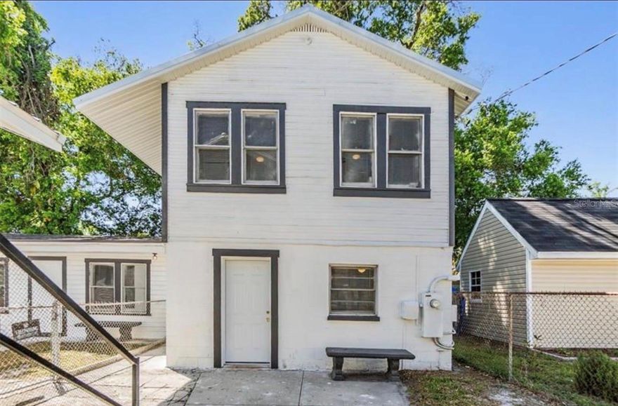 This beautifully updated 2-bedroom, 1-bath downstairs unit is located on the ground floor of the back unit and features a recently remodeled kitchen with shaker cabinets, quartz countertops, cooktop, new microwave, and new refrigerator.  The bathroom has also been fully remodeled, providing a clean and modern feel throughout. Rent includes all utilities—water, sewer, trash, and electric—making for convenient and worry-free living. First month, last month, and security deposit are due prior to move-in. Pets allowed at owners discretion. Additional units are also available within the same property, including a 5-bedroom, 2.5-bath single-family home, 1 bedroom upstairs apartment and ground level Studio Apartment. All available for immediate occupancy!