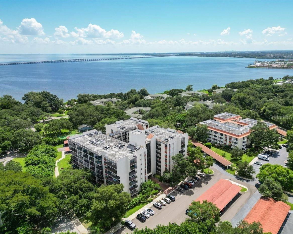 This is the right place at the right price for you!
Located in sunny Clearwater, Florida, this spacious two bedroom & two bath sixth floor corner condo has a new roof, is not located in a flood zone, and survived the last two hurricanes without any damage while being able to admire the water view of upper Tampa Bay. Beaches and Tampa or St. Pete / Clearwater airports are all less than twenty minutes away. Shopping and restaurants are within walking distance.
Outstanding views from the 6th floor corner unit with 1,450 sq ft of INTERIOR LIVING AREA, and two balconies accessed by three sets of sliding glass doors provide spectacular views of the serene surroundings of this beautiful community.
Some wonderful community amenities include heated pool, sauna, fitness center, and an expansive clubhouse with activity rooms for card games, meetings, and billiards. This building is open to all ages, making it suitable for a variety of lifestyles. Includes cable TV, exterior maintenance, water, and trash. The building has two elevators essential if you live above two floors up, extra storage cage in a shared room for additional storage space. A non-fifty-five plus building. Condo board application needed for approval. Call today for a private viewing.