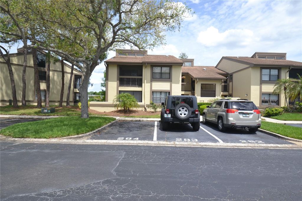 Photo of 284 Woodlake Wynde, Oldsmar, FL 34677 (MLS # TB8494637)