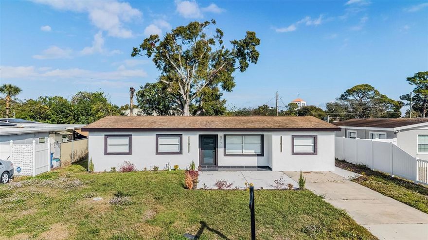 An amazing residence in a prime location!!! This is a beautiful fully renovated 4 bedrooms - 3 bathrooms home located in the desirable area of Town N’ Country in Tampa. The property was tastefully designed to satisfy the desires and needs of its new owners! From the moment you step inside, you will notice the extensive updates that have been made. The professionally remodeled kitchen offers a contemporary style boasting ample cabinetry with granite countertops, custom pendant lights above the kitchen island, stainless steel appliances and a modern sleek backsplash. The suite hosts a spa-like bathroom with rain shower head to allow for the most relaxing shower experience possible. The property exhibits a convenient open-floor plan with a perfect distribution featuring three additional bedrooms, fully renovated modern bathrooms, gleaming porcelain tiles throughout, recess lighting, ceiling fans, freshly painted interior and exterior, stucco and much much more!!! You will fall in love with this one as soon as you walk in the front door as it has the meat and bones needed for a new owner. The location provides easy access to major freeways for easy commuting! Tampa International Airport, beaches, multiple shopping centers including International Plaza, and it is less than 10 minutes from multiple parks, trails, and attractions. Don't miss out on the opportunity to own this beauty! Make your appointment today!