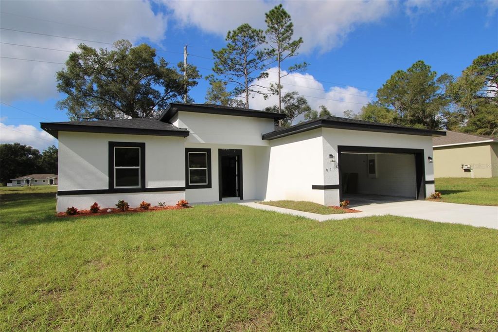 Photo of 9118 N Cortlandt Drive, Citrus Springs, FL 34434 (MLS # O6331967)
