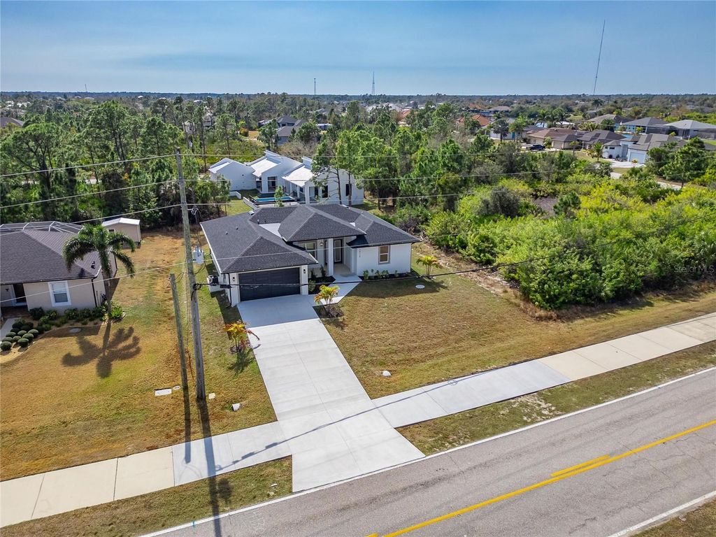 Photo of 14242 Ingraham Boulevard, Port Charlotte, FL 33981 (MLS # TB8476825)