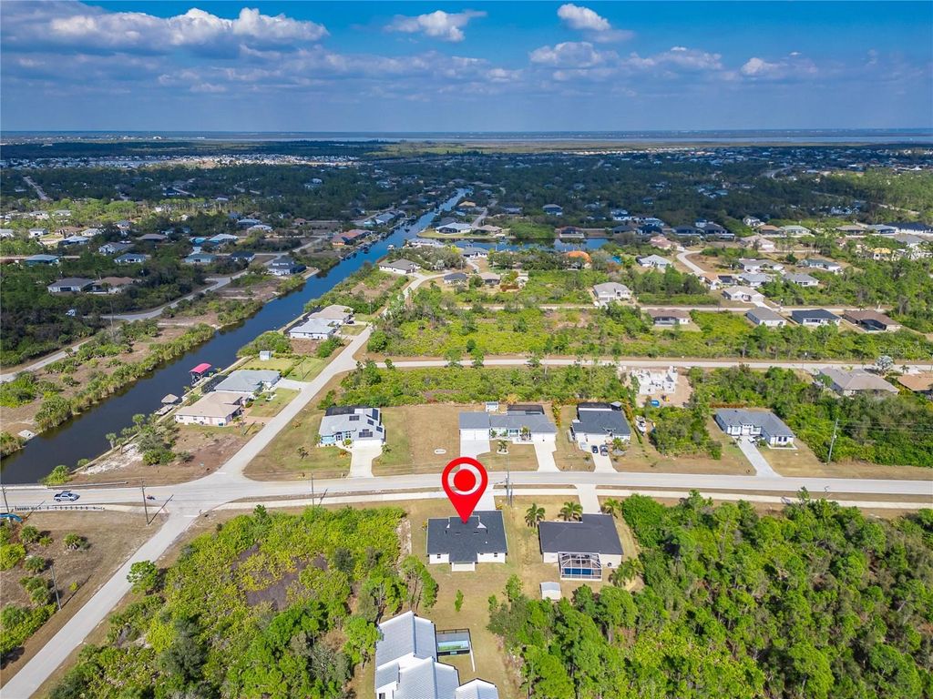 Photo of 14242 Ingraham Boulevard, Port Charlotte, FL 33981 (MLS # TB8476825)